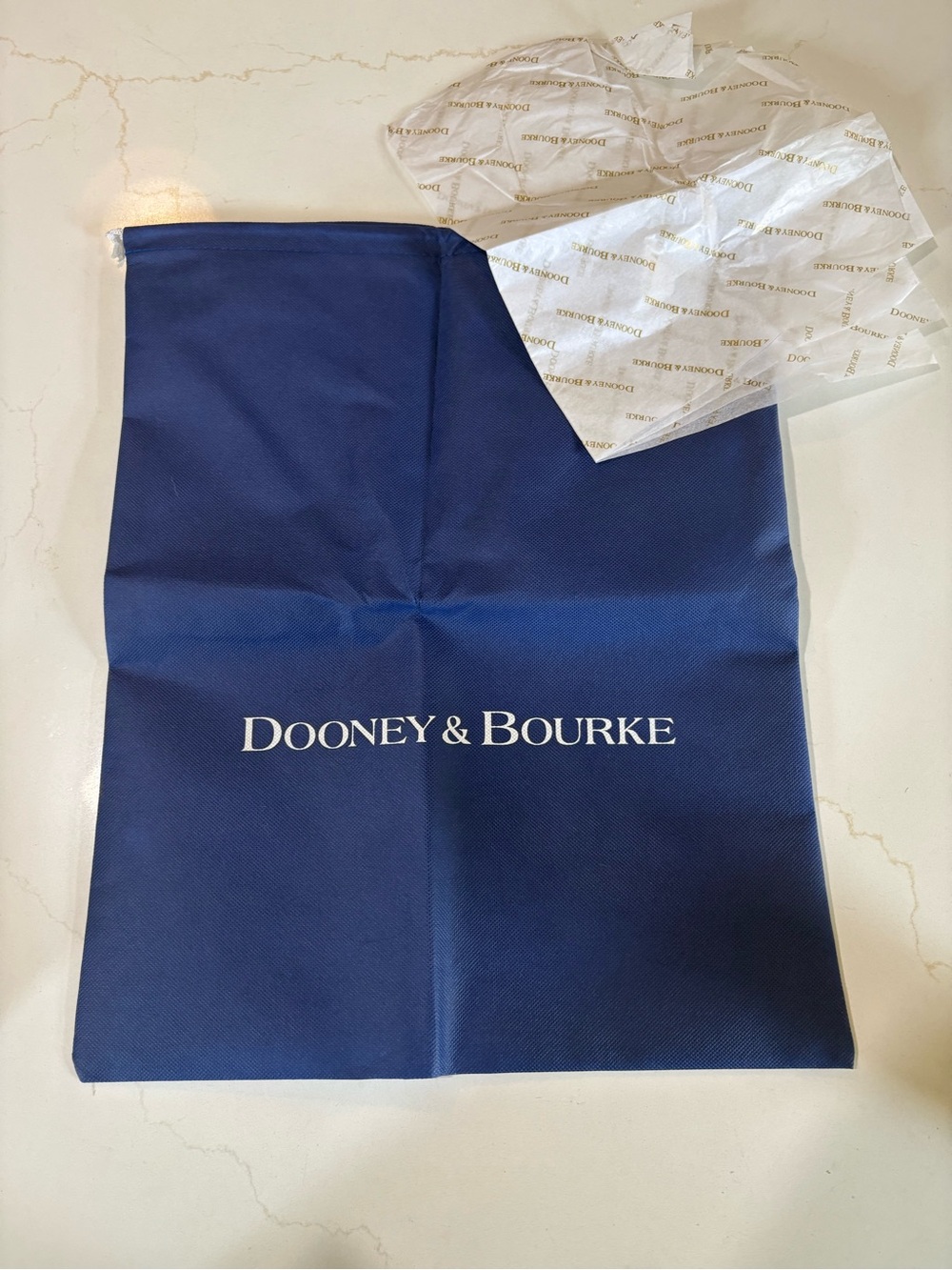 Dooney and Bourke dust cover